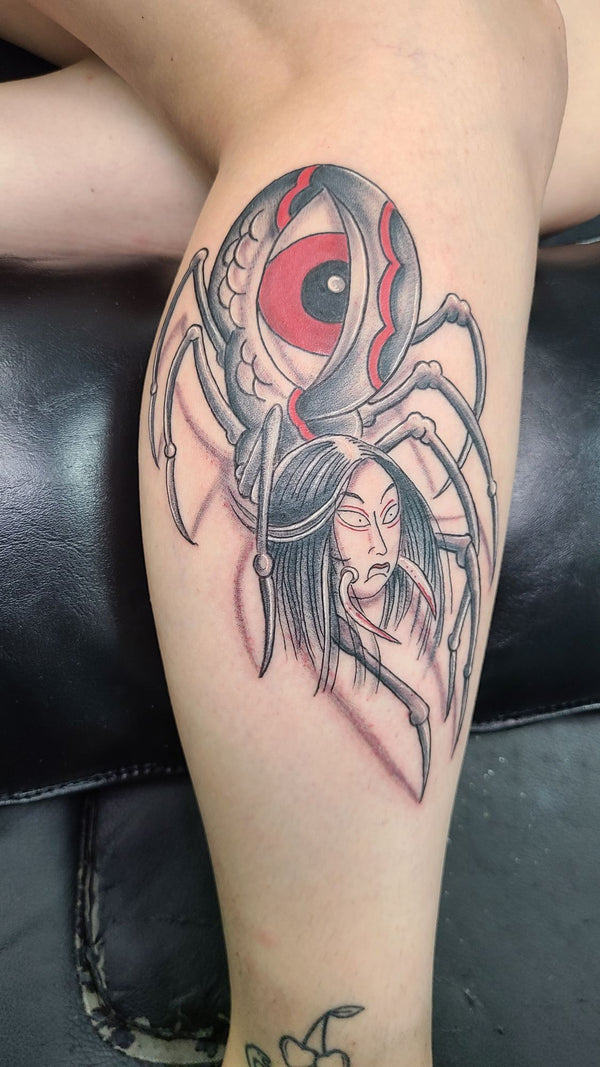 Color spider and rose tattoo