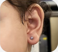 ear pierced of a baby girl