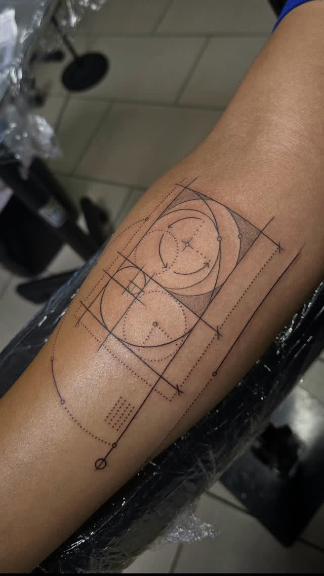 Tattoo by Angel at Z-Edge Gulf Gate: fine line golden ratio geometric forearm piece
