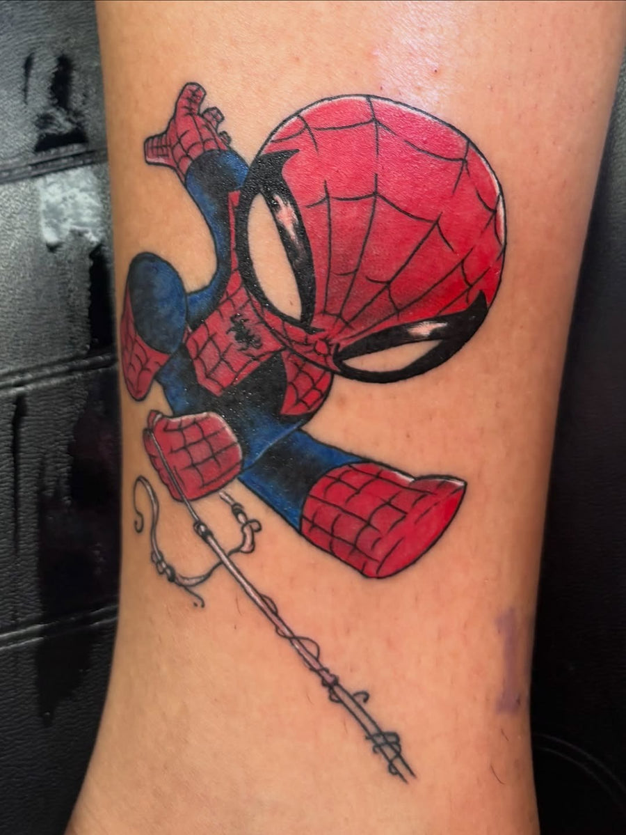 Tattoo by Manny at Z-Edge Gulf Gate: chibi spiderman color leg