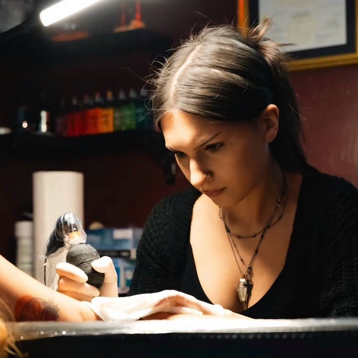 Paige tattooing at Z-Edge Venice