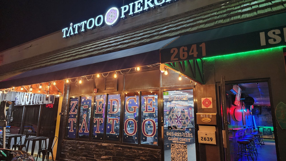 Z-Edge Gulf Gate storefront on Mall Drive at night